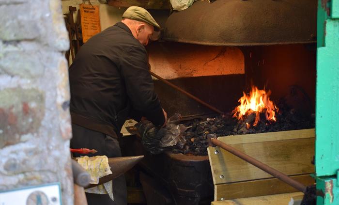Our Outdoor exhibits include a working Forge